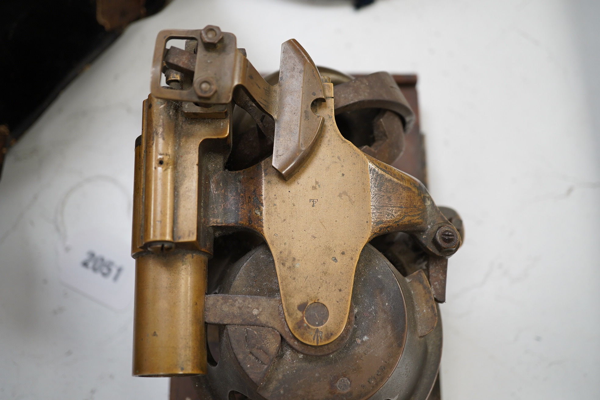 A First World War torpedo gyroscope, stamped 2878 W&Co. top part of the wooden case missing, 21cm high x 24cm wide. Condition - some general wear and damage, unknown if in working order.